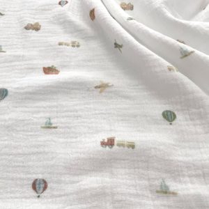 Mussola con Certificazione Oeko-Tex e GOTS bianca con stampa mongolfiere e trenino