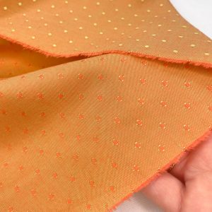 cotone certificato a pois arancio su base arancio double-face