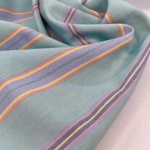 Cotone morbidissimo tinto in filo azzurro a righe colorate con Certificazione Oeko-Tex