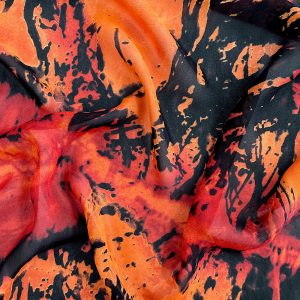 Georgette di viscosa sfumata nelle tonalità dell'arancio, rosso e nero