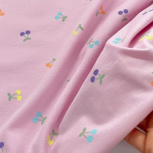 Jersey Certificato GOTS rosa con ciliegie colorate