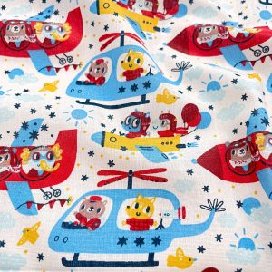 Tessuto in cotone certificato GOTS con stampa elicotteri blu e rossi
