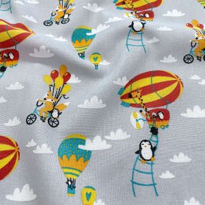 Cotone Certificato GOTS con stampa mongolfiere colorate su base grigia