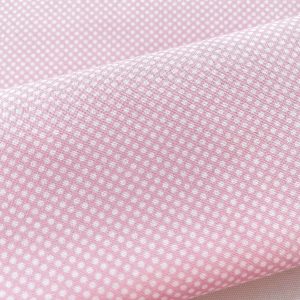 Cotone Certificato GOTS a pois bianchi su base rosa ideale per fiocchi nascita e cucito creativo