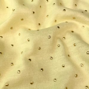Maglina di cotone con borchiette su base giallo pastello