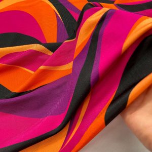 Maglina in viscosa con stampa onda nelle tonalità del fucsia e arancio